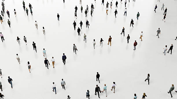 istock Business people walking on a white surface, following different paths and directions 2249319401