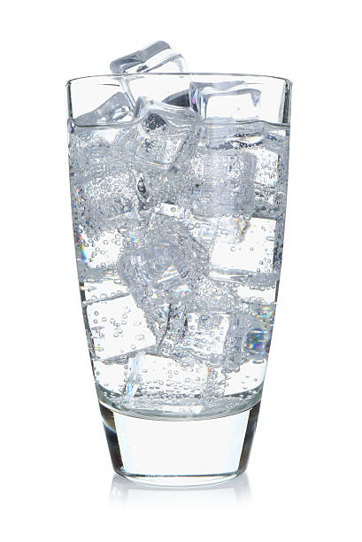 istock Refreshing soda water with ice cubes in glass isolated on white 2249321066
