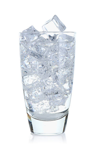 istock Refreshing soda water with ice cubes in glass isolated on white 2249321069