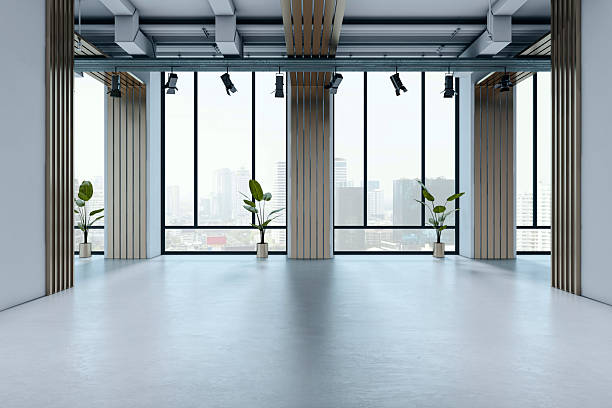 istock Empty modern office interior with large windows and city view, featuring minimal design, bright light, and a clean corporate environment. 3D Rendering 2249322877