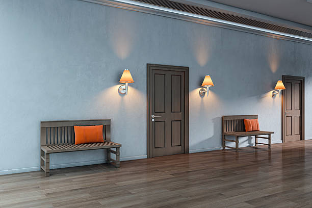 Stylish corridor with wooden benches, orange cushions, and wall lamps, modern graphic style, wooden floor background, concept of interior design. 3D Rendering
