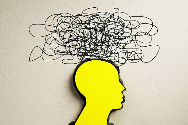 istock Abstract yellow human head silhouette with tangled black lines symbolizing chaotic thoughts on light textured background. Creative mental concept.. 3D Rendering 2249323084