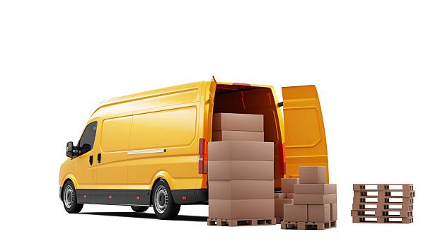 istock Yellow delivery van with cardboard boxes on pallets at rear 2249327597