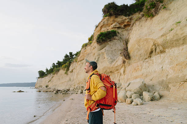 Portrait of a male backpacker exploring local beaches
