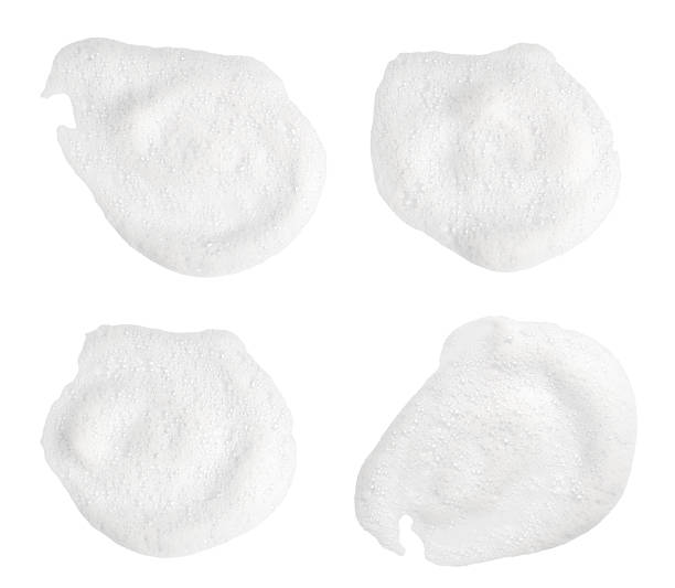 istock set top view liquid white foam soap, shampoo, or shower gel. Abstract bubbles. isolated on white background. Clean concept, cosmetic visuals for a suds product. realistic soap texture with detailed bubble 2249329334