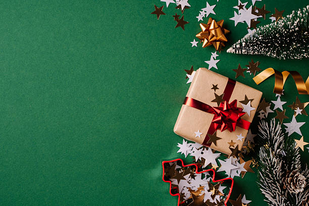 istock Christmas Gift and Decorations on Green Background 2249330480