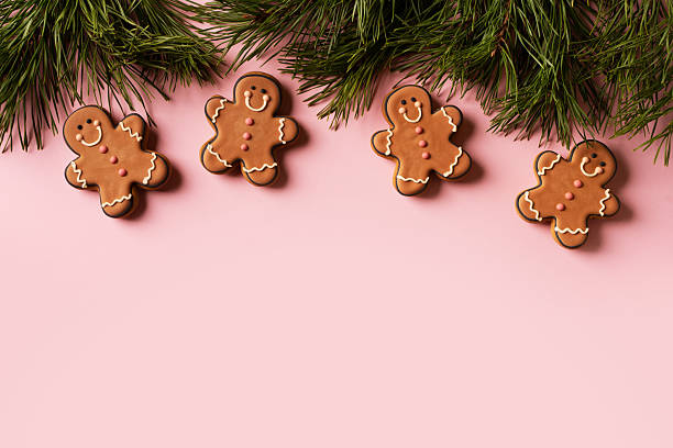 istock Funny gingerbread cookies with christmas decor and fir 2249331297