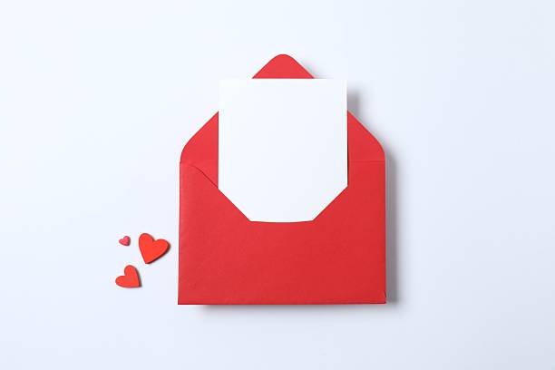 istock Paper envelope with red hearts on white background 2249331779