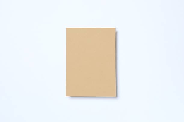 istock Craft paper card on color background 2249332680