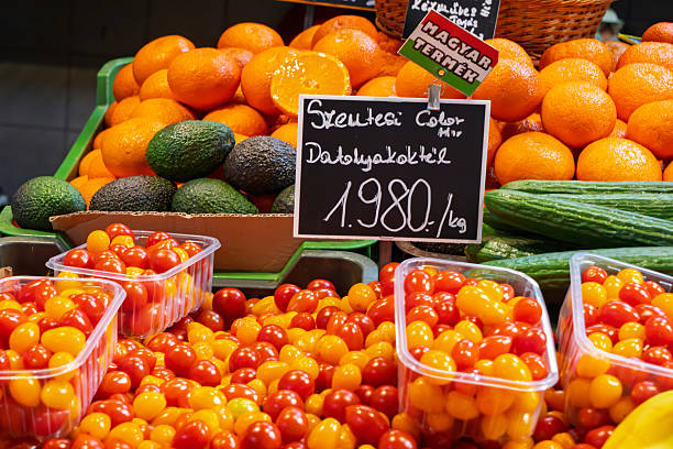 Heirloom tomato and yellow melon on marketplace. Farmers market with vegetable and fruit in Alcudia, Mallorca