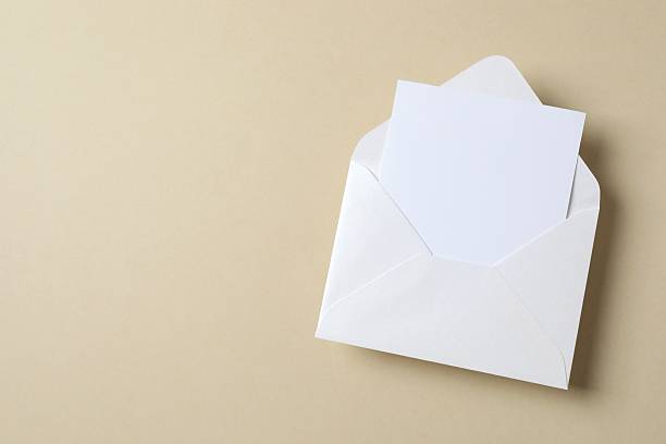 istock Top view photo with paper card and envelope on color background with empty space 2249334800