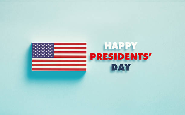 istock American Tiny Flag On Blue Background - Happy Presidents' Day Concept 2249336988