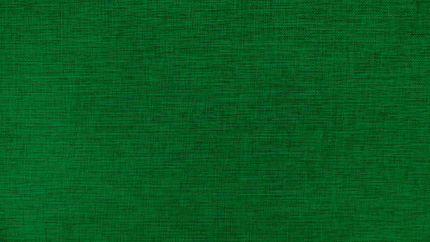 istock Green linen fabric texture background. High resolution close up of natural woven textile surface. Green canvas material pattern for abstract wallpaper or furniture upholstery design. 2249337626