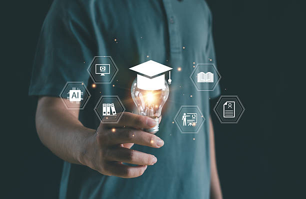 istock Creative education concept with glowing light bulb and graduation cap representing digital learning, AI innovation, and smart knowledge for modern academic and technology development. 2249338226