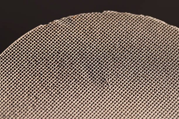 istock parts of an old ceramic catalyst made of modern ceramic materials, ceramic catalyst with a large number of holes for cleaning emissions after prolonged operation 2249340363