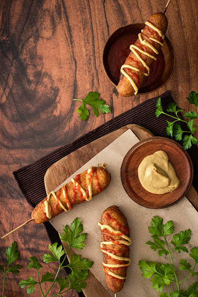 Homemade Corn dogs on a rustic background