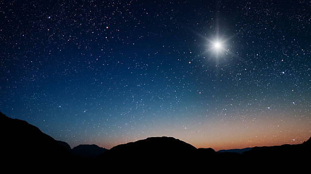 istock night Christmas panorama with a star in the sky 2249342347