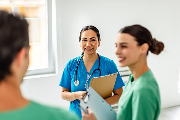 istock Healthcare workers collaborate in a hospital setting, showcasing dedication and teamwork among medical professionals 2249347812
