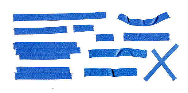 istock Blue Painter's Tape Strips on white Background Forming Abstract Cross Shape for Design and Craft 2249348373