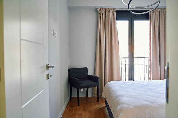 istock Inviting and Modern Bedroom Design Showcasing Natural Light with a Serene Atmosphere Ideal for Relaxation and Comfort 2249349251