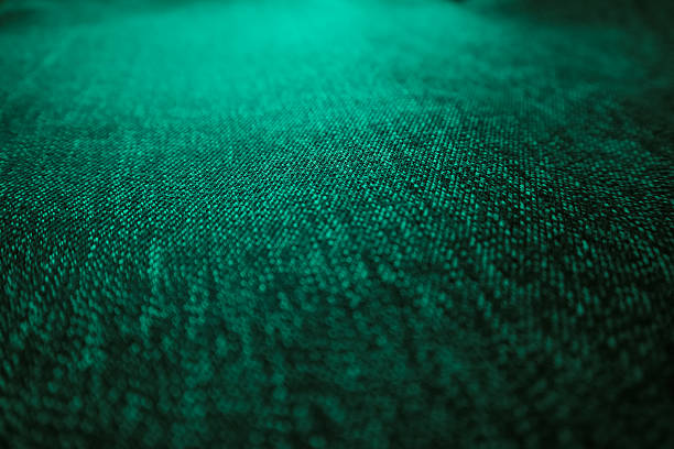 Fabric texture. Smooth turquoise satin luxury cloth texture can use as abstract holidays background. Beautiful dark turquoise background, wallpaper for design decoration element