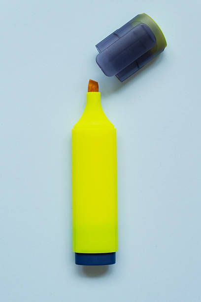 Highlighter on a white background. Office Mazaki to the sketch lie on a white countertop. White background.
