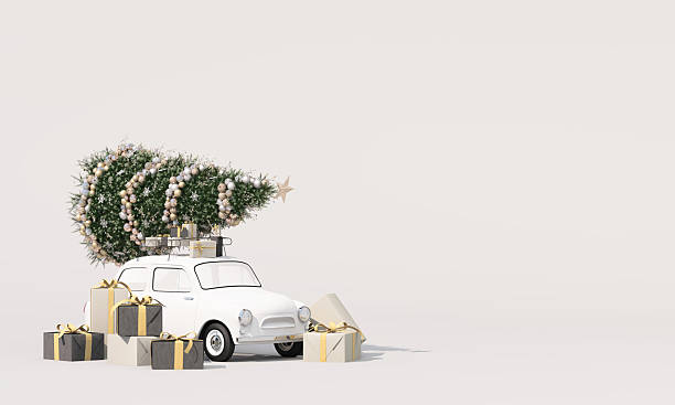 istock A classic white car carries a large decorated Christmas tree on its roof, surrounded by elegant gift boxes in gold and black tones, evoking holiday travel and festive celebration. 3d rendering. 2249358580