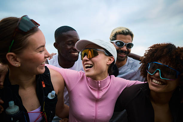 Group portrait of Latin sporty people after training workout outdoors in Mexico Latin America, large and diverse group of hispanic people of different ages, multi age and inclusive concept