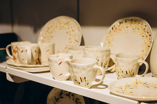 istock Handmade printed cups on store shelf for gift idea concept. 2249364155