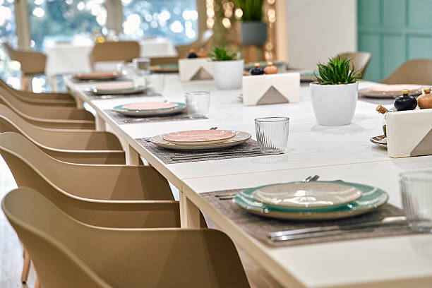 istock A Beautifully Set Dining Table with Elegant Tableware, Featuring Plates, Glasses, and Natural Decor for an Inviting Eating Experience 2249364589