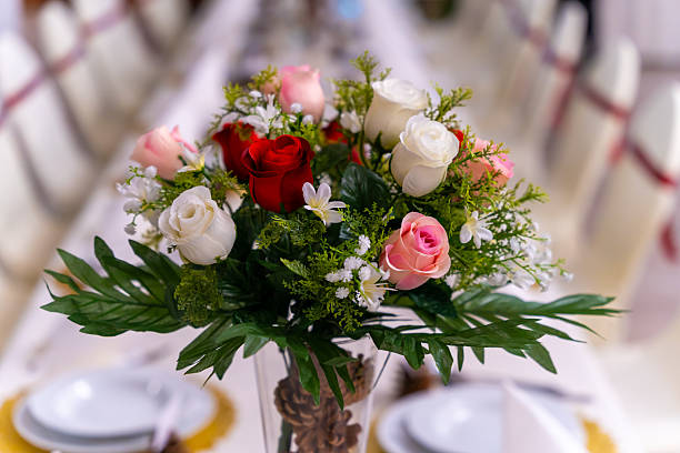istock Colorful Rose Bouquet Arrangement On Wedding Reception Table Creating Elegant Floral Centerpiece 2249365757