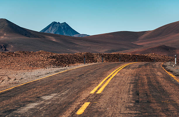 istock Desert Road Toward Distant Mountains in Atacama 2249366850