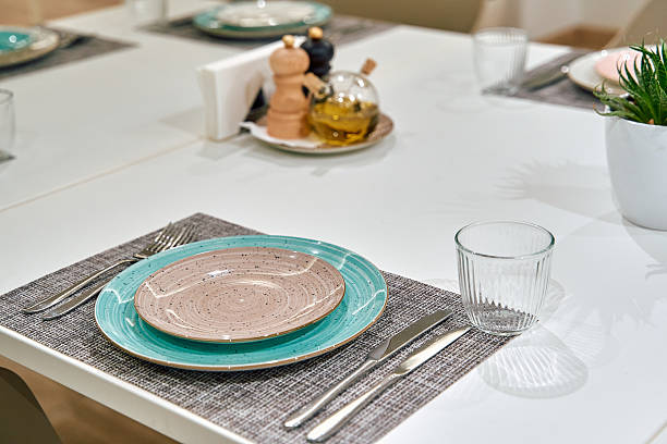istock Elegant Dining Setup Featuring Stylish Plates, Glassware, and Utensils on a Trendy Table Setting Ready for a Memorable Meal Experience 2249367898