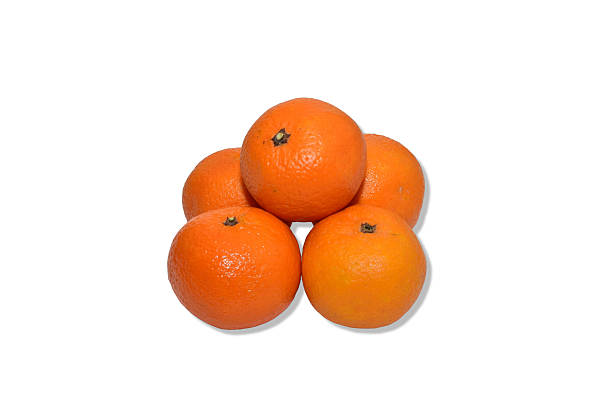 A pile of ripe oranges on a white background.