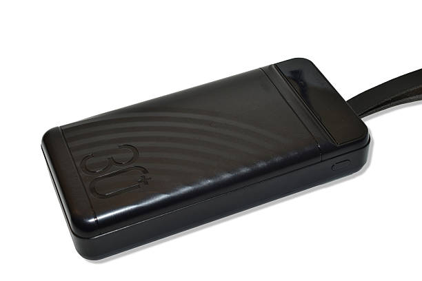 External battery or power bank of black color isolated on white background.