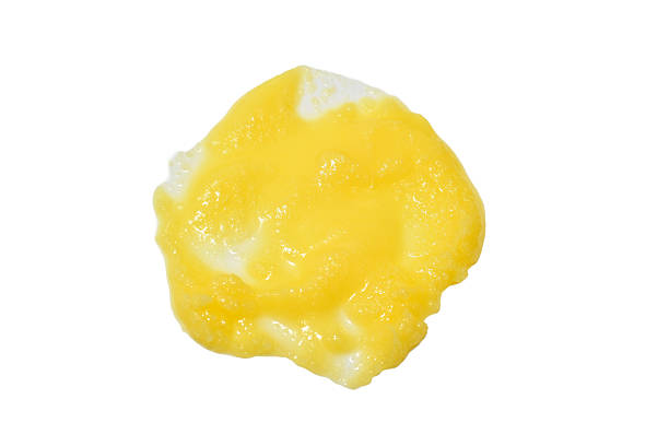 Yellow ghee stain isolated on white background.