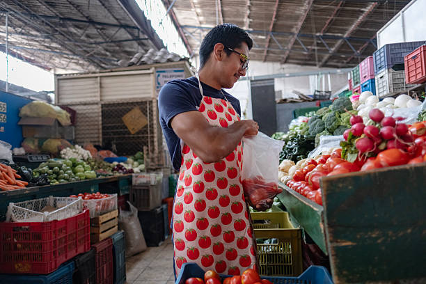 young professional managing and running their fruit and vegetable business