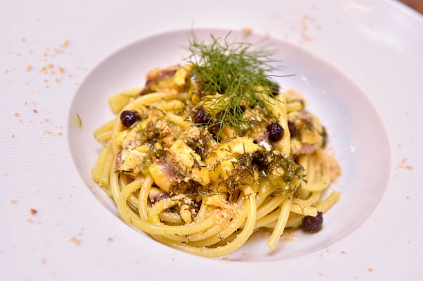 istock Pasta con le sarde e finocchietto or Bucatini with sardines and fennel is a typical dish of Sicilian and Palermo cuisine 2249377501
