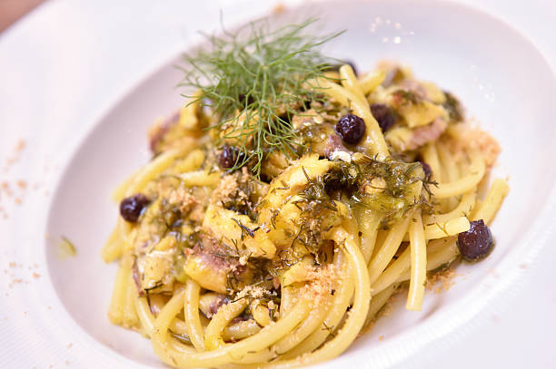 istock Pasta con le sarde e finocchietto or Bucatini with sardines and fennel is a typical dish of Sicilian and Palermo cuisine 2249377508