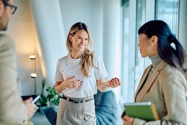 istock Business colleagues discussing project ideas in modern office 2249378046