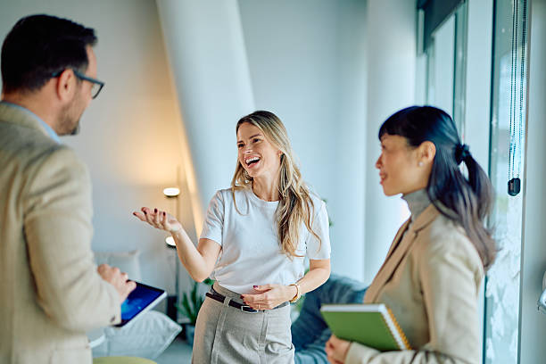 istock Diverse business professionals having a fun casual meeting 2249378075