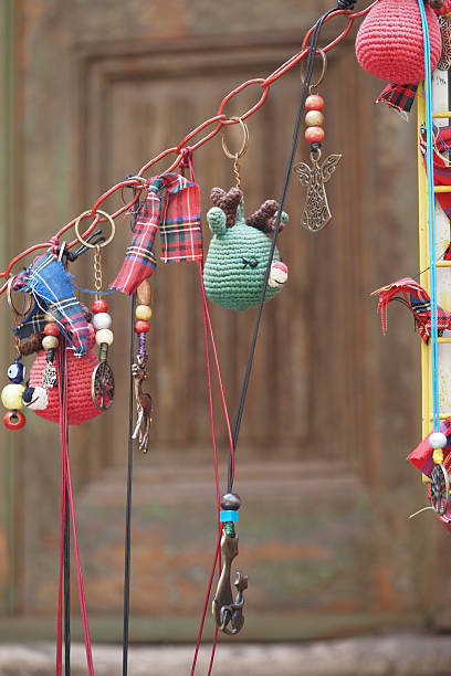 istock Colorful handmade crafts displayed on a market stall 2249378592