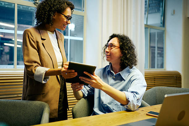 istock Engaging Collaborative Business Meeting in a Contemporary Office Environment Setting 2249378890