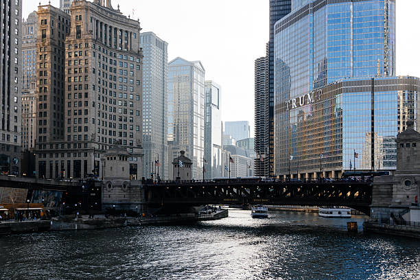 Chicago cityscape of buildings around river, business architecture and skyscrapers at the daylight. Financial district and city park. Illinois, USA, North America