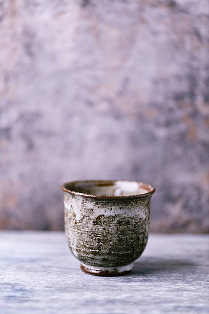 istock Traditional japanese ceramic on rustic wooden background. Soft focus. Copy space. 2249384470