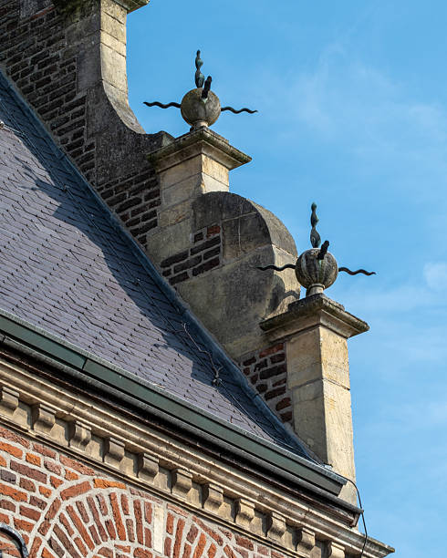 istock gable with decorations on a medieval building in the netherlands 2249390654