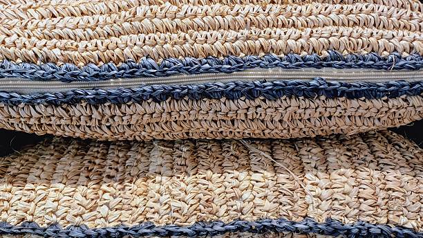 istock Pillow. cushion.   Natural patterned woven rattan 2249392345