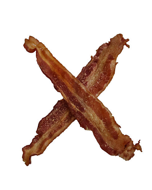 istock Two strips of cooked, crispy bacon are arranged in an 