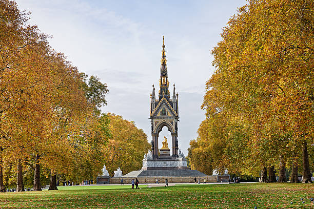 London, United Kingdom, Apr 17, 2011 : The Peter Pan statue in Kensington Gardens. The statue shows the boy who would never grow up, blowing his horn on a tree stump with mice, fairies and squirrels in a leafy glade