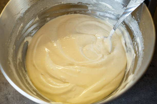 istock Beating cream for a sweet dessert in a food processor. Cream nozzle 2249396332